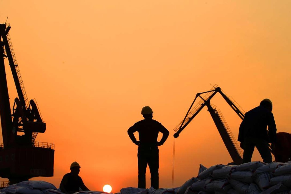 Workers load goods at a port in Nantong in Jiangsu province. China’s ‘One Belt’ strategy calls for billions of dollars to be ploughed into new railways, ports, and energy projects in 65 countries. Photo: Reuters