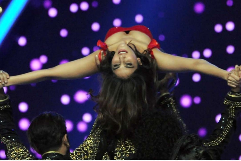 Indian Bollywood actress Vaani Kapoor, the female lead for the film Befikre, performs at the Umang Mumbai Police Show in Mumbai last month. Photo: AFP