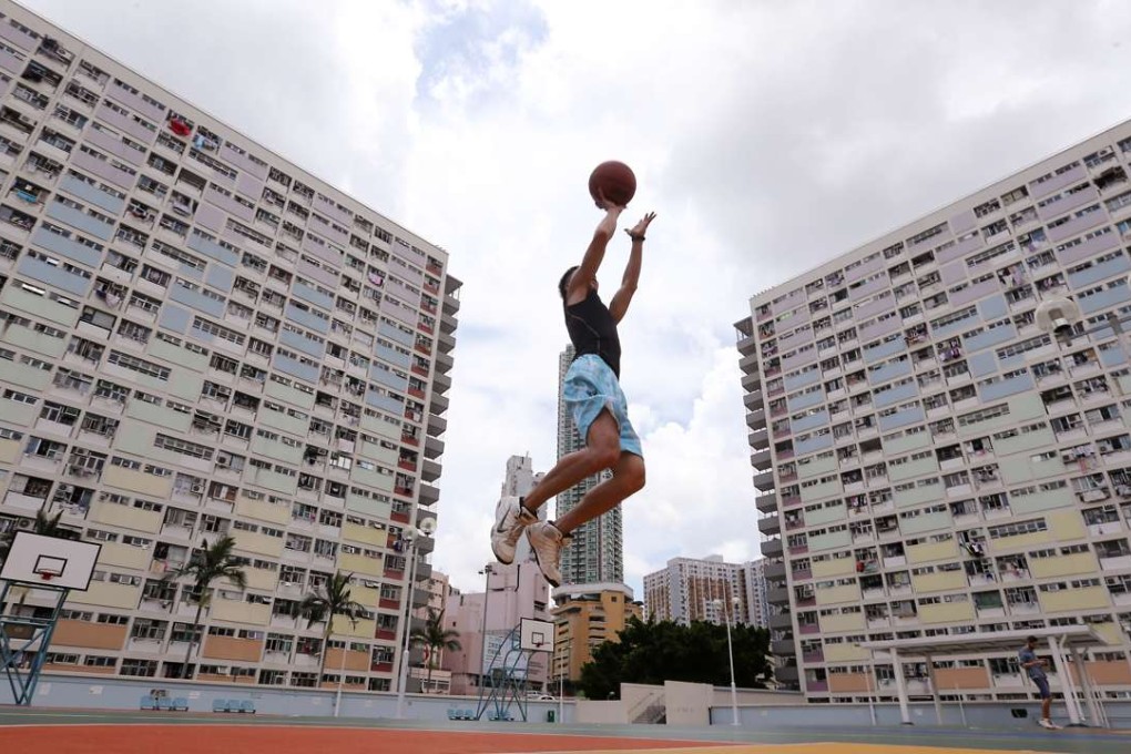 A man playing basketball in a playground at Choi Hung Estate. Photo: Felix Wong
