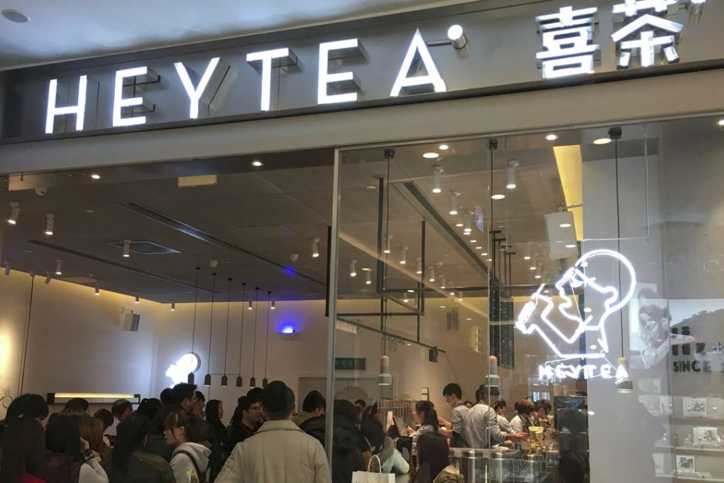 Hundreds of residents queued for hours to get a taste of Heytea products at a newly opened outlet in Shanghai. Photo: SCMP