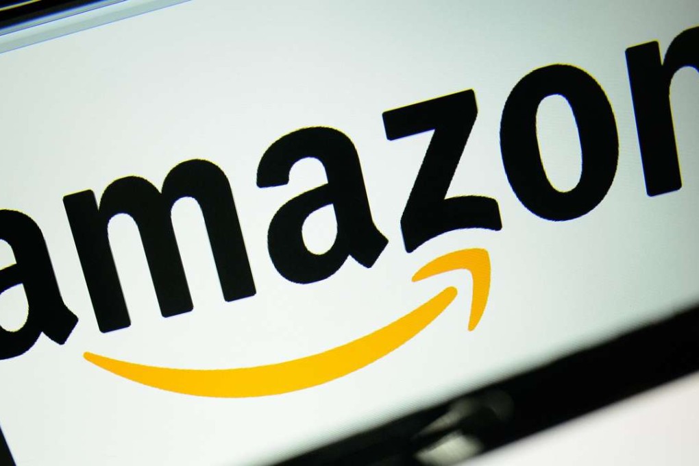 The logo of the online retailer Amazon displayed on computer screens in London. Photo: LEON NEAL/AFP