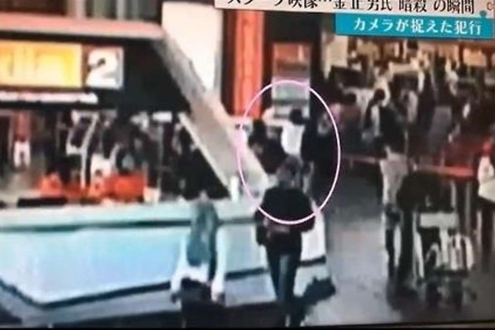 A screenshot from a CCTV video shows a woman in white at Kuala Lumpur International Airport, moments before she pounces on a man identified as Kim Jong-nam. Photo: Fuji TV