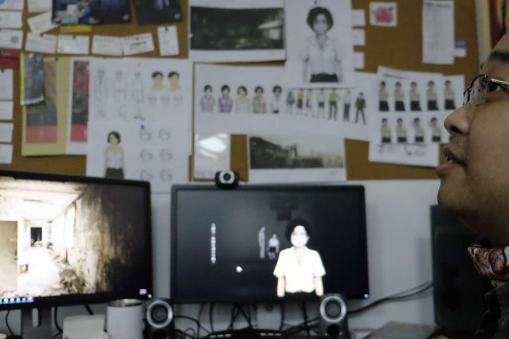 Game developer Yao Shuen-ting shows scenes from his horror game “Detention”. Photo: AFP