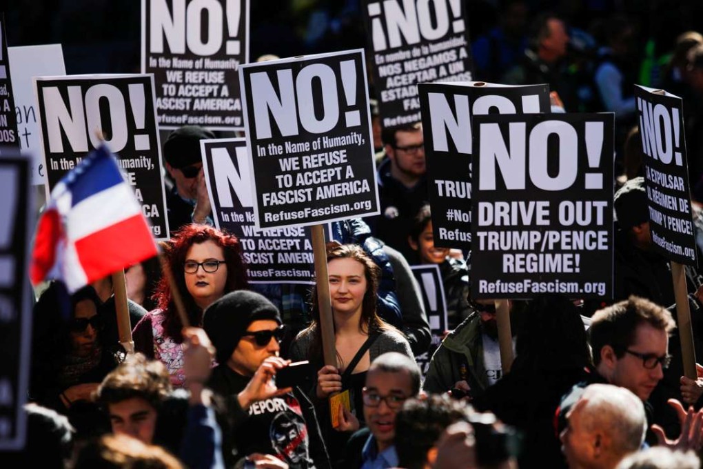 People take part in an "Not My President's Day" rally in Manhattan, New York on Monday, a holiday in the United States. Photo: Reuters