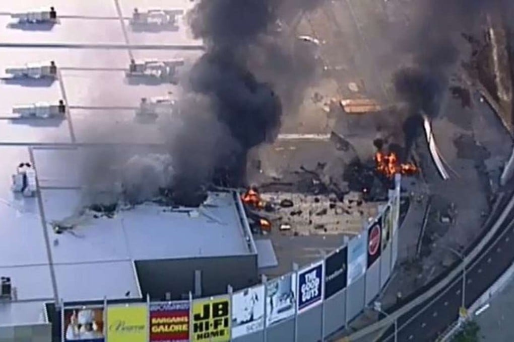 The scene of the Melbourne plane crash, captured from the air by the 9 News helicopter. Photo: Twitter / @9NewsMelb