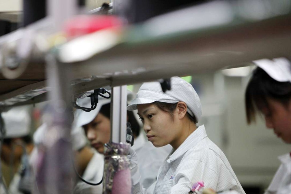 A file picture of workers on shift at a Foxconn plant in Shenzhen. Photo: Handout
