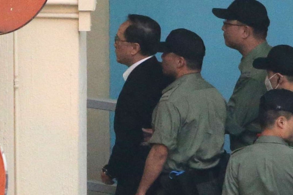 Donald Tsang being escorted on Monday. Photo: Felix Wong