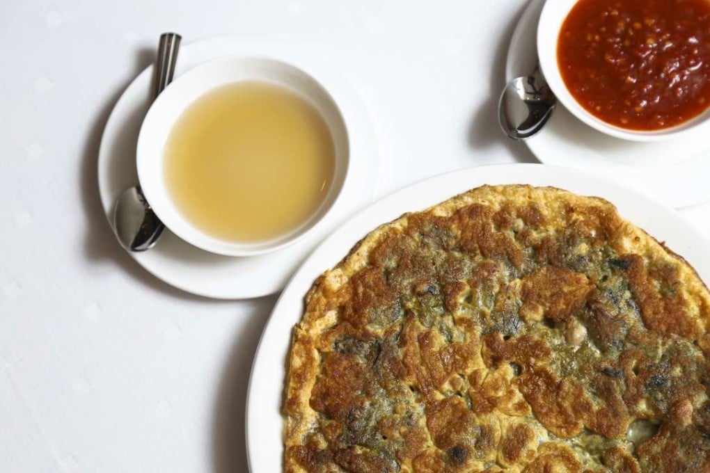 Pan-fried egg batter with baby oysters from Chiu Tang in Central. Photos: James Wendlinger
