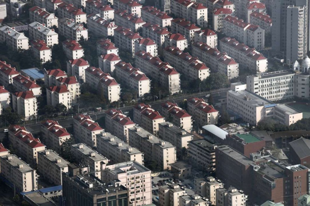 Shanghai’s January new home prices fell 0.1 per cent from a month earlier, reflecting the effectiveness of government curbs on speculative buying. Photo: AFP