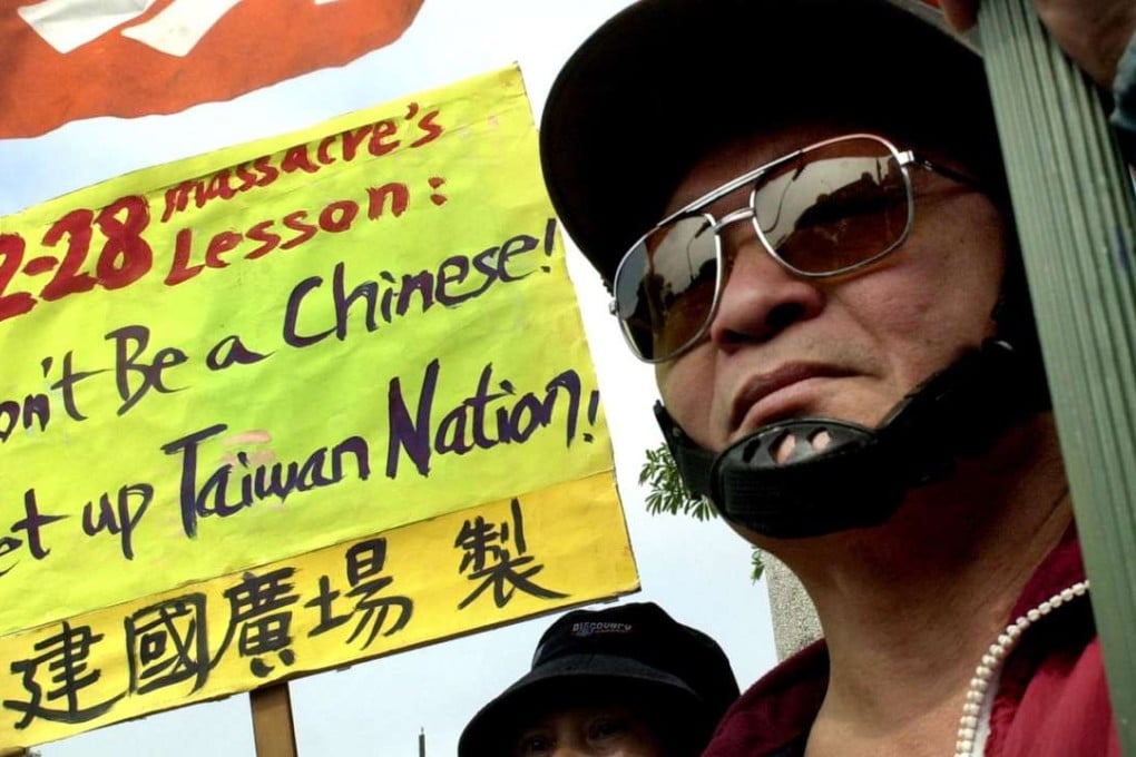 A pro-independence activist in 2003 marks the anniversary of the bloody 228 crackdown known as the 228 incident. Photo: AP