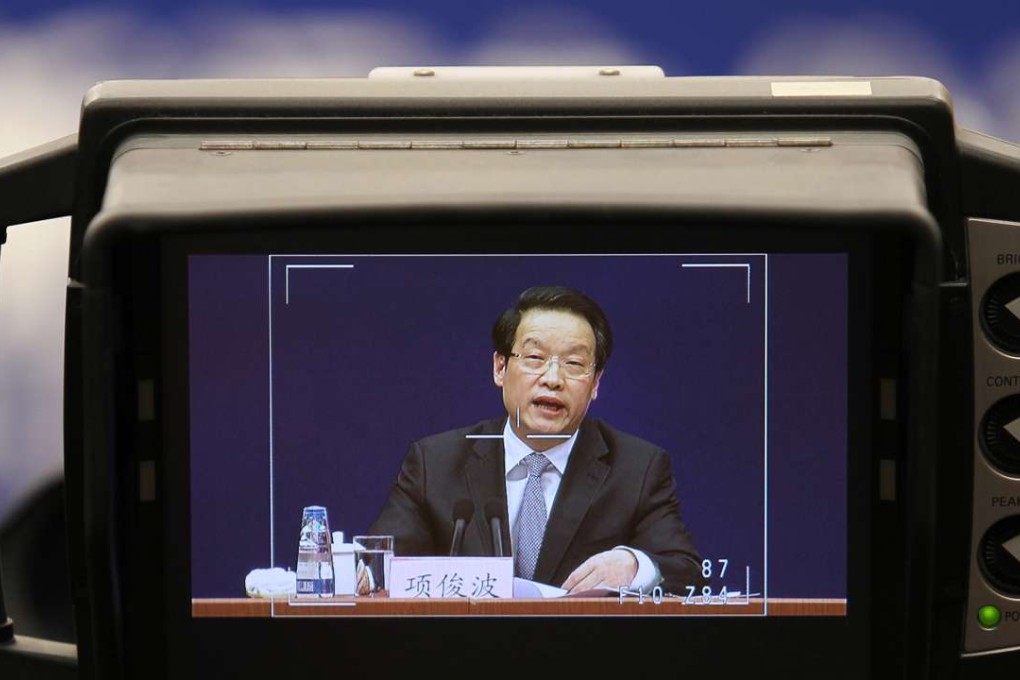 Xiang Junbo, Chairman of the China Insurance Regulatory Commission, speaking at his first public appearance since January 12, where he chimed in on a war of words against illicit fund raising by insurance companies, vowing to crack down on companies that breach the regulator’s rules.Photo: Simon Song