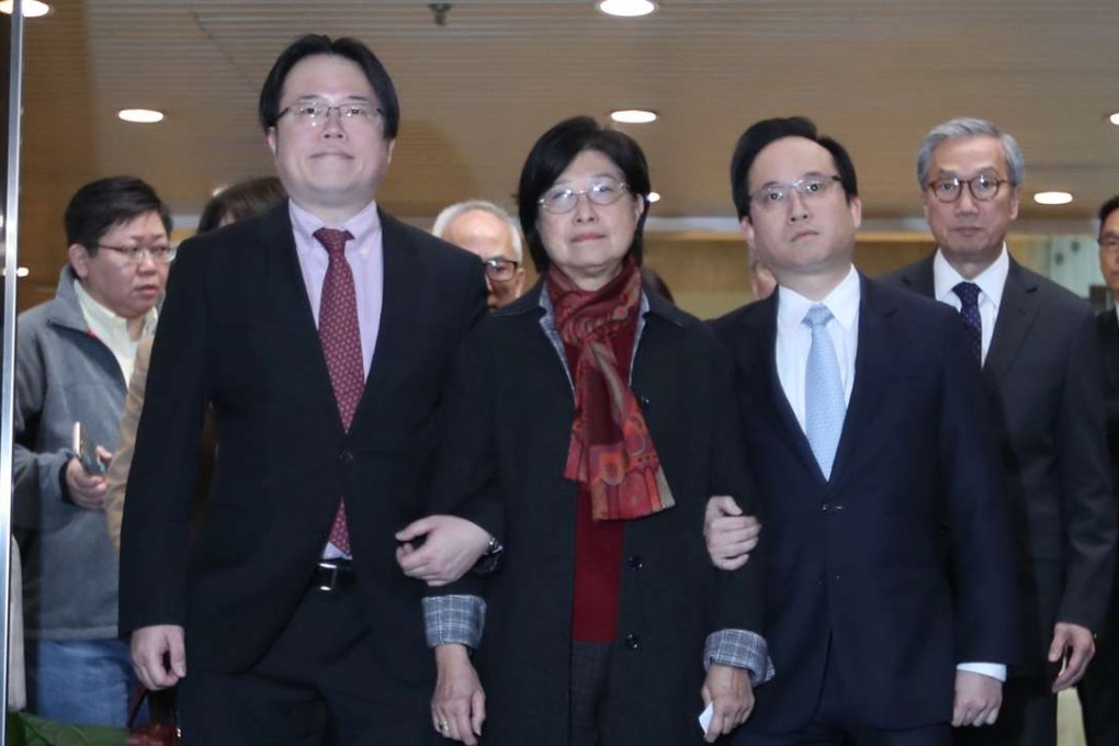Former chief executive Donald Tsang’s wife, Selina Tsang Pou Siu-mei, flanked by her two sons. Photo: Nora Tam
