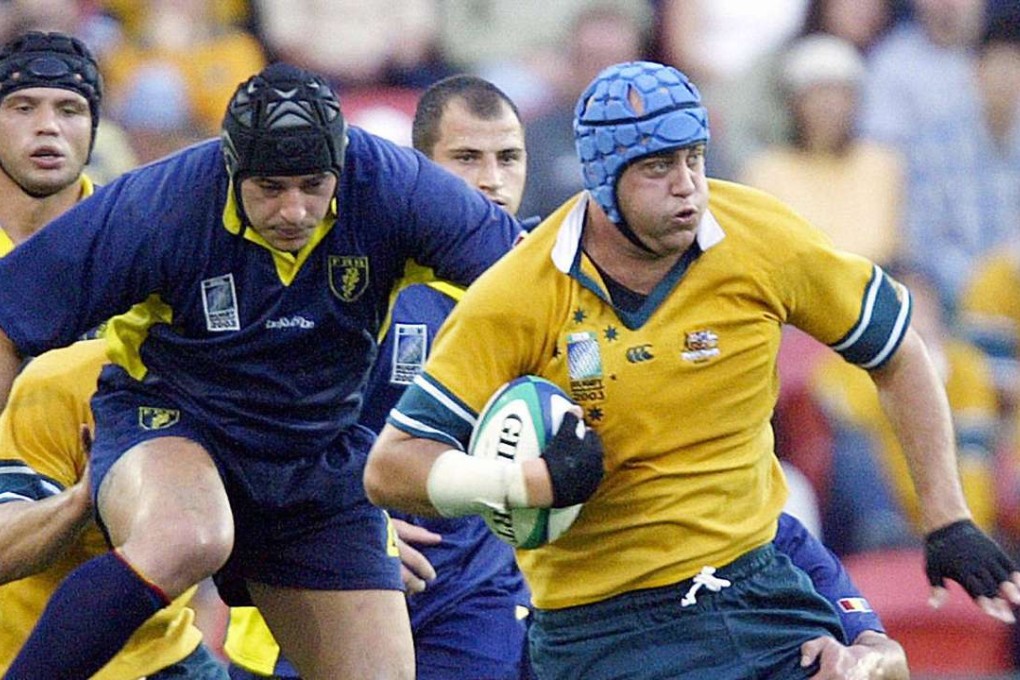 Former Australia lock Nathan Sharpe (right) is one of the names under consideration for the Classic Wallabies. Photo: AFP