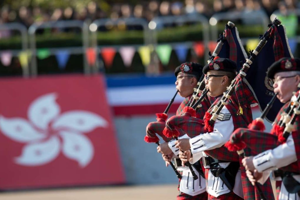 Bagpipe players from the Hong Kong Police Band play during a passing-out parade at Hong Kong Police College last Saturday. Photo: EPA