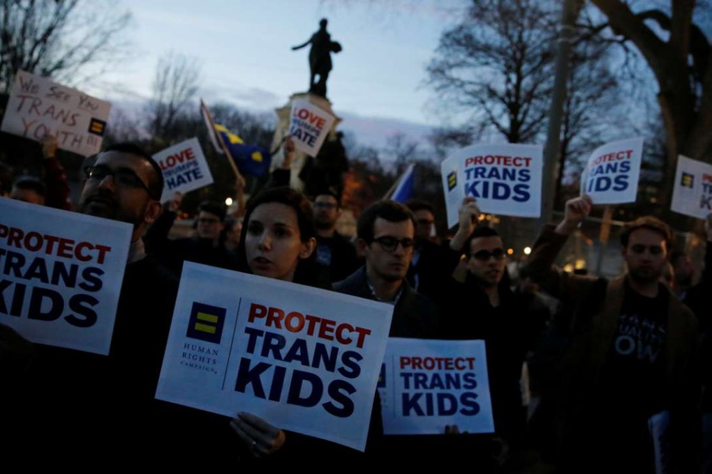Transgender activists and supporters protest potential changes by the Trump administration in federal guidelines issued to public schools in defence of transgender student rights, near the White House in Washington on Wednesday. Photo: Reuters