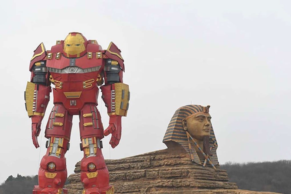 The new 30-metre tall statue stands next to a replica Sphinx. Photo: Handout