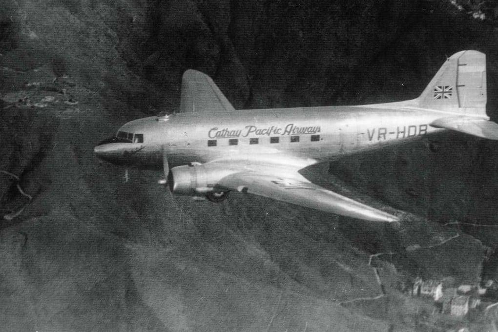 A Cathay Pacific DC-3 passenger aircraft in the air over Hong Kong in the late 1940s. Picture: Cathay Pacific Airways