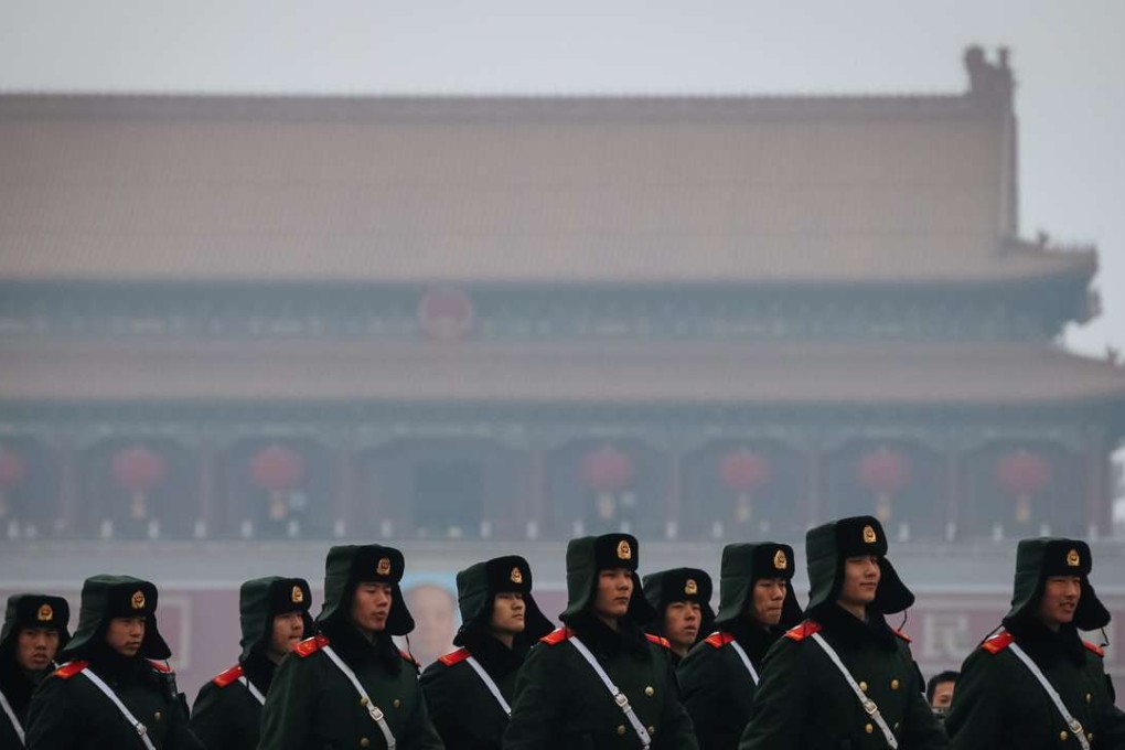 Chinese soldiers march at Tiananmen Square on a heavily polluted day in Beijing, China, on January 26, 2017. Photo: EPA