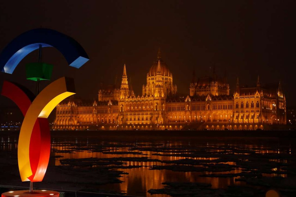 The Hungarian Parliament is seen with the Olympic logo at a promotional spot as the Hungarian capital bids for the 2024 Olympic Games. Hungary will be withdrawing its bid for the games. Photo: Reuters