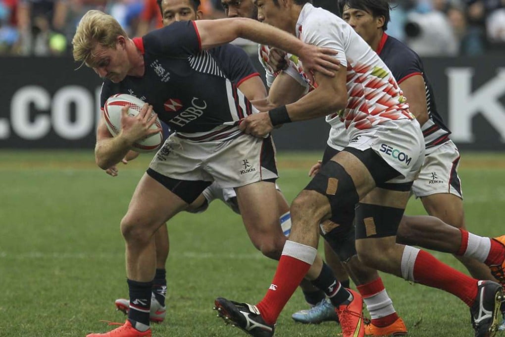Hong Kong’s Jamie Hood takes it to his Japan opponent. Photo: Bruce Yan