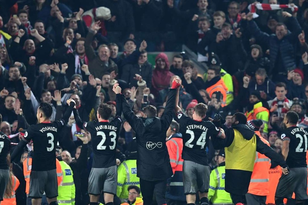 Southampton players applaud their fans after their League Cup semi-final victory over Liverpool. Photo: AFP