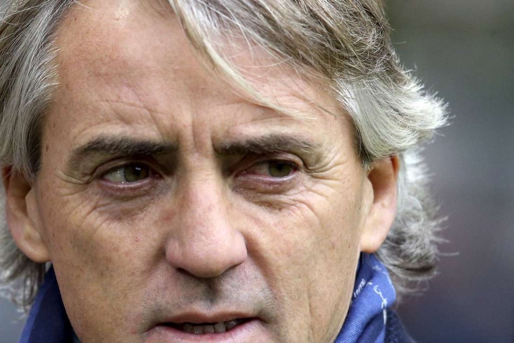 Roberto Mancini is a proven winner in England, having won the title with Manchester City. Photo: Reuters