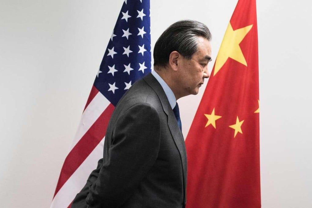 China’s Foreign Minister Wang Yi waits to speak to US Secretary of State Rex Tillerson at a G20 conference in Bonn, western Germany. Photo: AFP