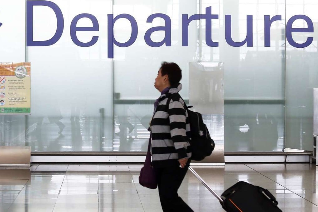 Leung Chun-ying denies exerting pressure on the Hong Kong airport staff to bypass security rules to deliver the piece ofleft luggage, which his younger daughter had left behind, to her at the boarding gateat the time. Photo: Dickson Lee