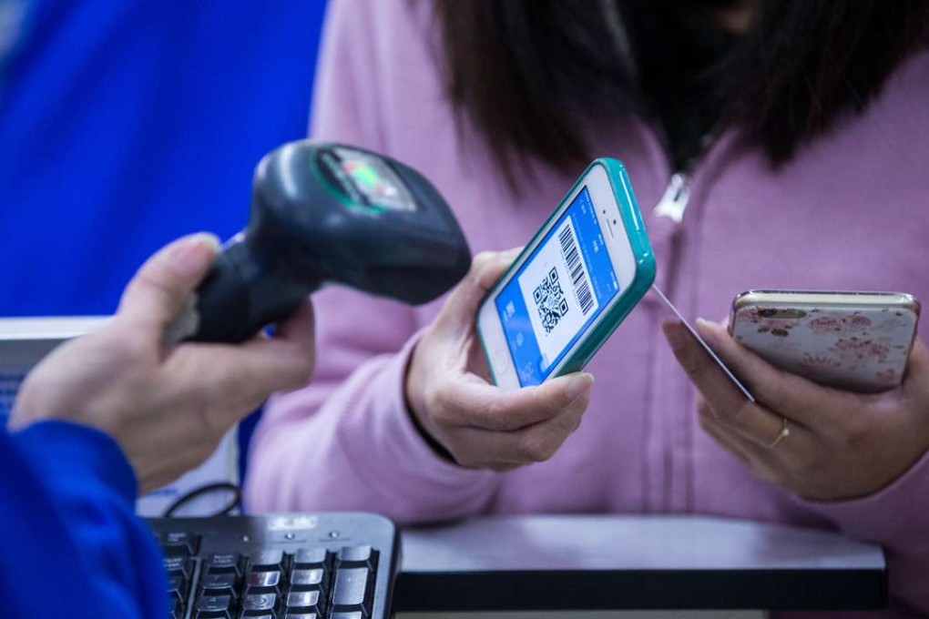 According to Network Information Centre, a state-backed agency, 469 million people in China used their smart devices to make payments in 2016, an increase of 31.2 per cent from a year ago. Photo: Imaginechina