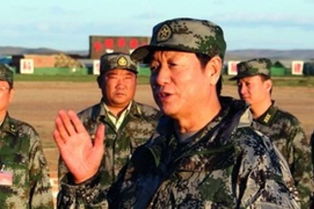 General Wang Xibin is seen with subordinates in an undated photo. Photo: People.cn