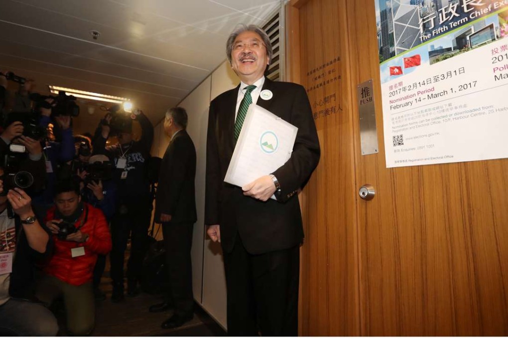 John Tsang beams on arrival at the electoral office with his nominations. Photo: Edward Wong