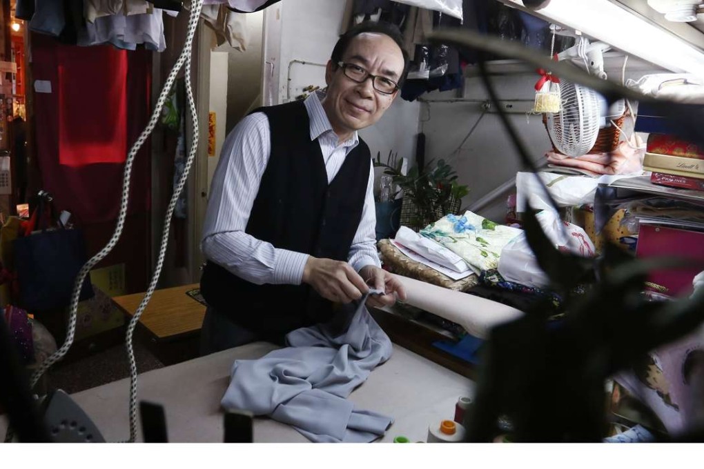 Kan Hon-wing at work in his shop in Sheung Wan. Photo: Jonathan Wong