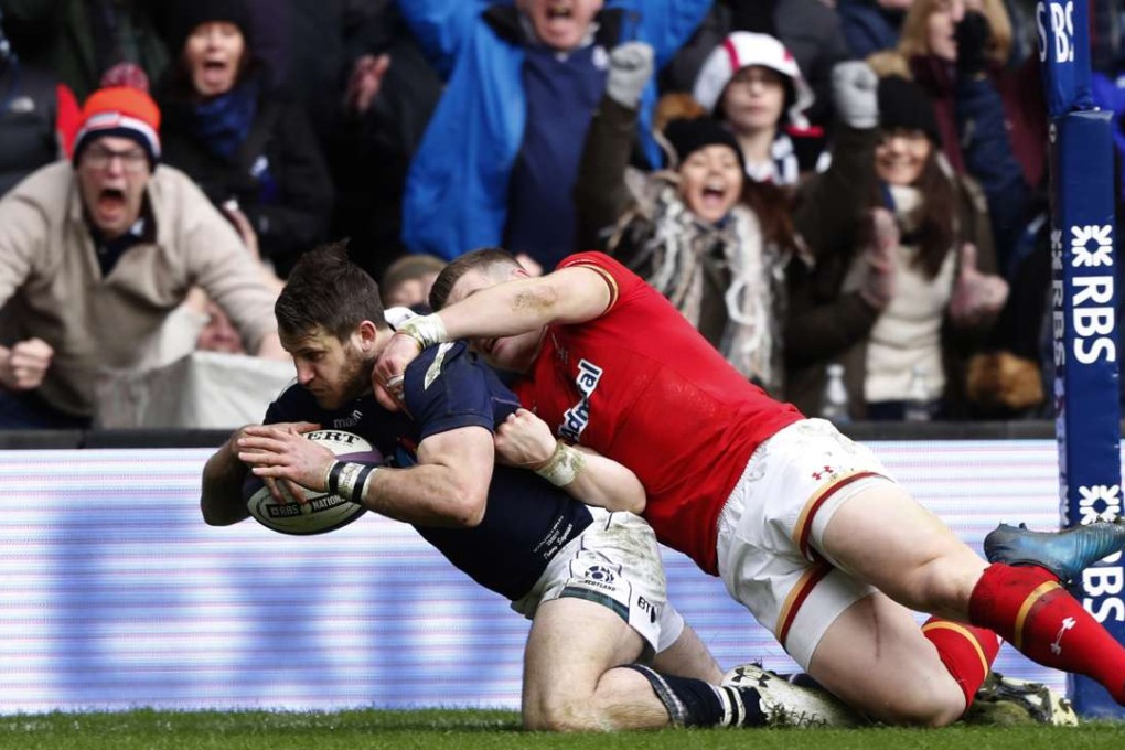 Scotland’s Tommy Seymour scores his team’s first try in their Six Nations encounter against Wales at Murrayfield, Edinburgh. Photo Reuters
