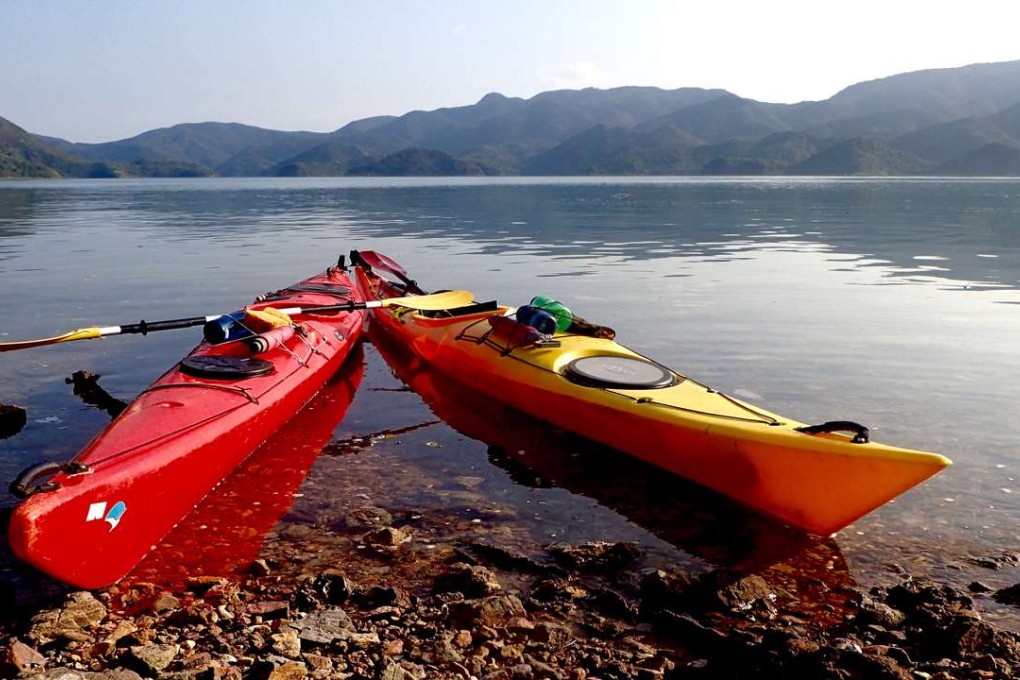 Kayaks on the beach near Sai Lau Kong. Photos: Cameron Dueck.