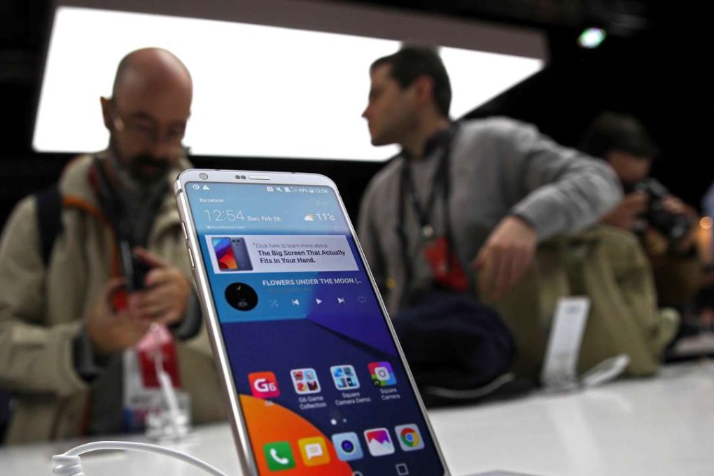 Visitors at the Mobile World Congress (MWC) in Barcelona. The congress is said to be the largest of its kind for the mobile industry and is held this year under the motto 'The Next Element.' Photo: EPA