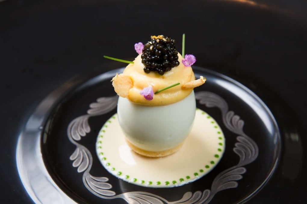 Robuchon au Dome’s mimosa egg with imperial caviar and king crab