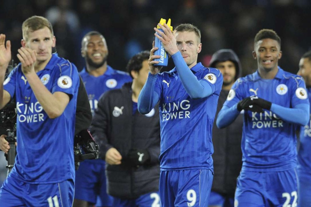 Leicester players applaud fans after beating Liverpool 3-1. Photo: AP