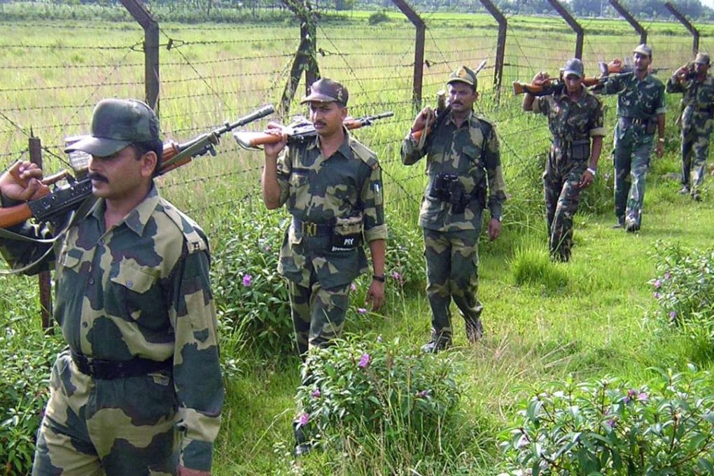 Indian security personnel patrol the border with Bangladesh. Photo: AFP
