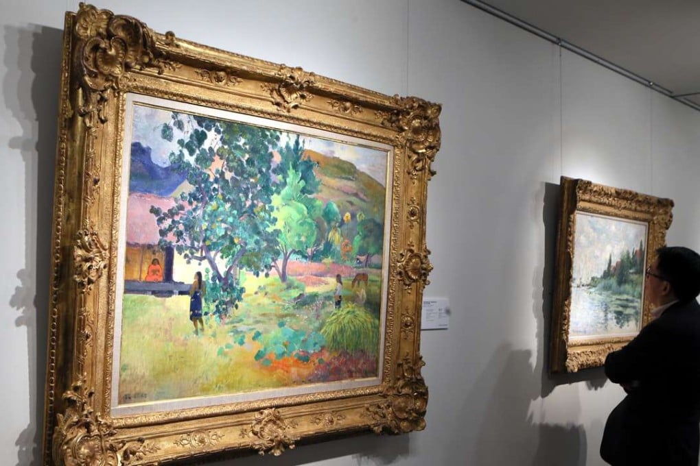 Paintings on show at the Christie's 20th Century Week Highlights Tour in Hong Kong on January 19. Hong Kong has the largest concentration of wealthy population in Asia. Photo: Xinhua