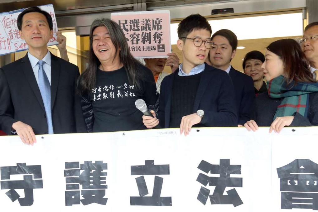 (From left) Lawmakers Edward Yiu Chung-yim, Leung Kwok-hung, Nathan Law Kwun-chung and Lau Siu-lai appear at the High Court. Photo: Dickson Lee