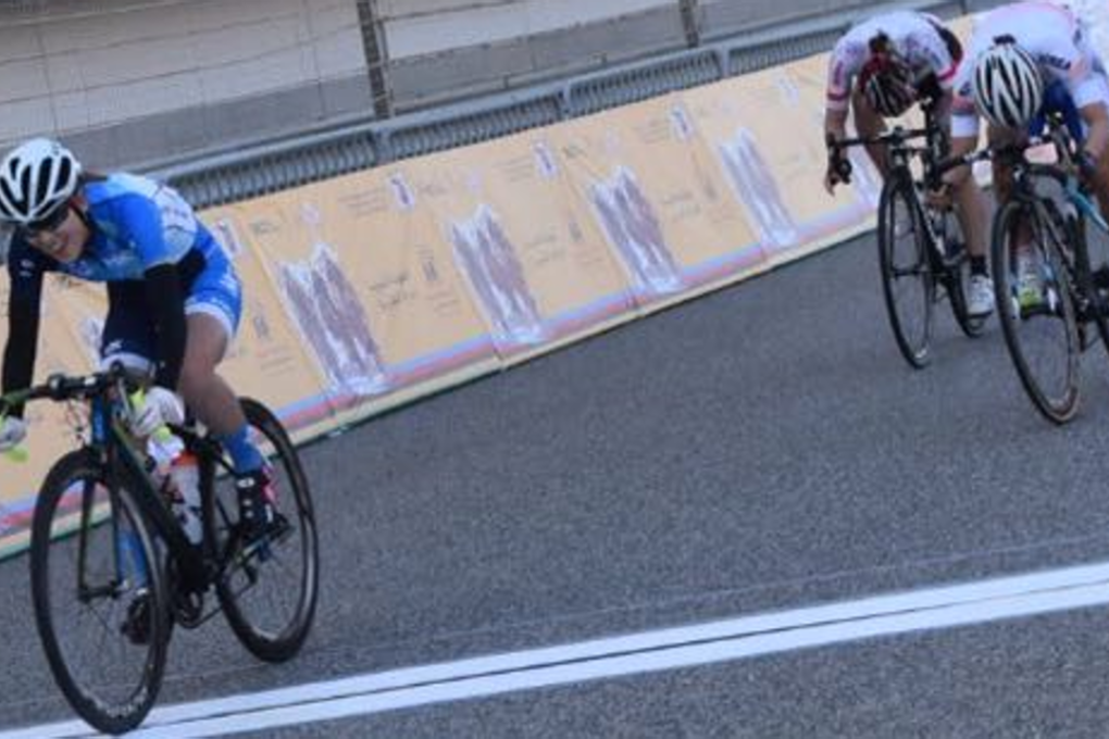 Yang Qianyu crosses the finish at the end of the 89.6km road race at the Asian Cycling Championships in Bahrain. Photos: Handout