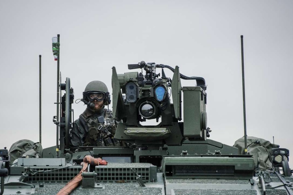 A soldier from the Swedish Armed Forces in a Patria XA-360 AMV (Armoured Modular Vehicle) at Hagshult Airbase, Sweden. File photo: AFP