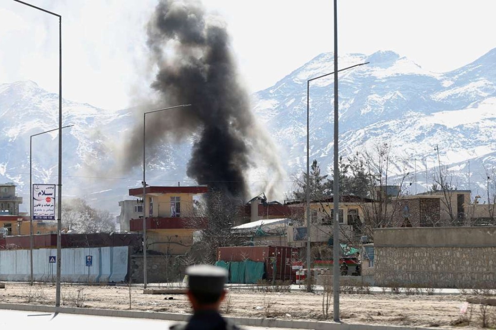 Smoke rises from the site of a blast and gunfire between Taliban and Afghan forces in Kabul. Photo: Reuters
