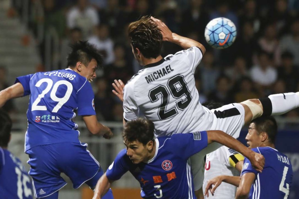 Eastern’s Diego Eli Moreira (front) and Leung Chun-pong (left) fight for the ball with Kawasaki Frontale’s Michael Fitzgerald during the AFC Champions League draw between the sides. Photos: Jonathan Wong