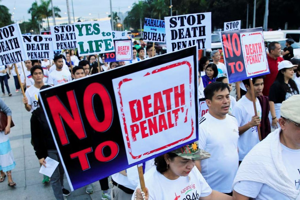 Participants join a protest against plans to reimpose the death penalty. Photo: Reuters