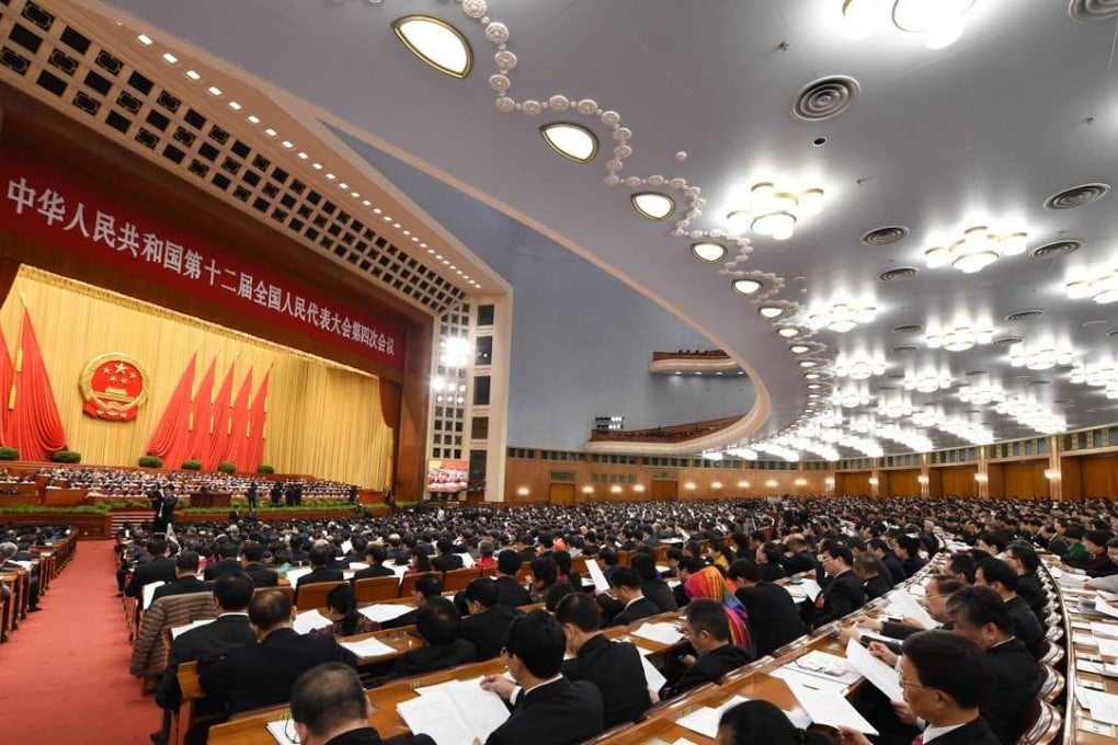 Deputies and delegates attend the Two Sessions annual plenary meetings at the Great Hall of the People in Beijing last year. Photo: Xinhua