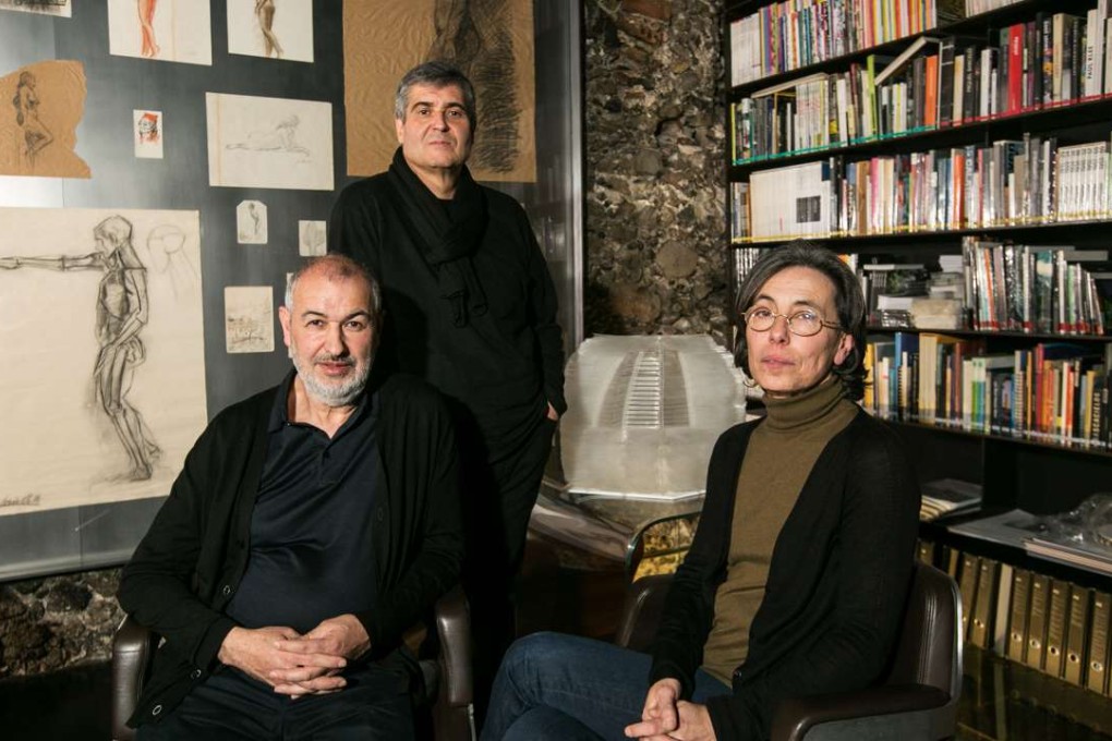 Pritzker Prize 2017 winners, Rafael Aranda (centre), Carme Pigem (right) and Ramon Vialta pose in their office in Olot, Spain, on Wednesday. Photo: AFP