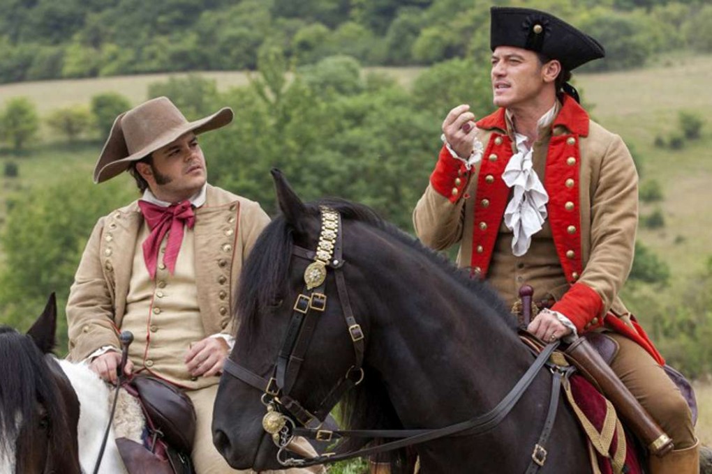 Luke Evans, right, stars as Gaston and Josh Gad as LeFou in Disney's Beauty and the Beast. Photo: Laurie Sparham, Walt Disney Studios