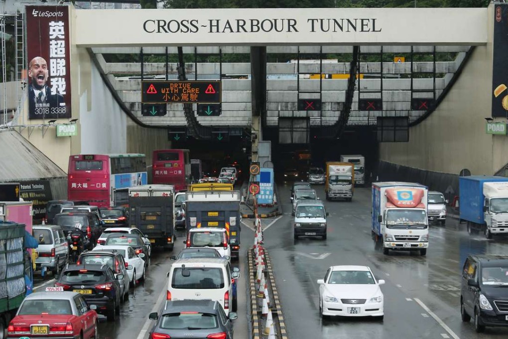 Slow traffic on the Tsim Sha Tsui end of the Cross-Harbour Tunnel. The government should standardise the tolls for the three cross-harbour tunnels, enabling drivers to choose the tunnel that suits their destination rather than one that’s the cheapest. Photo: Nora Tam