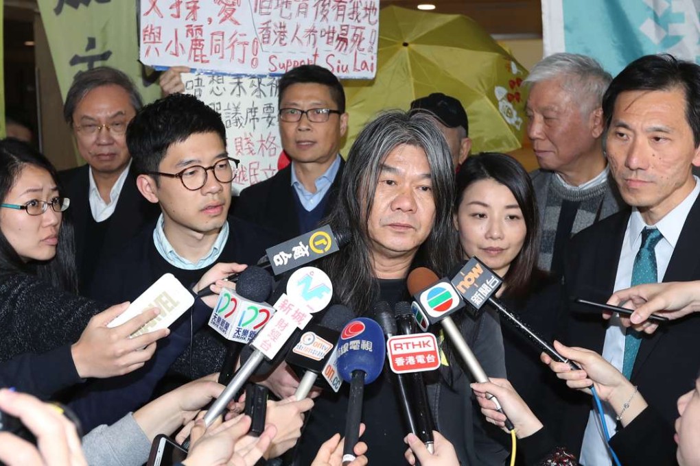 Lawmakers (from left) Nathan Law, Leung Kwok-hung, Lau Siu-lai and Edward Yiu face the media outside court at the end of three-day hearing. Photo: Edward Wong